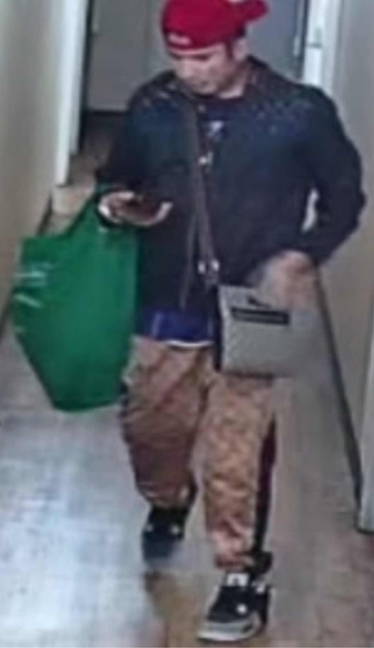 Surveillance image of Phoenix Wayne Opwam
