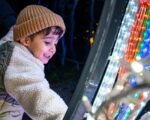 Child enjoying the lights at Bear Creek Lights in Surrey