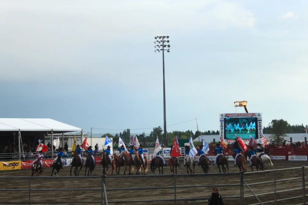 Cloverdale Rodeo flags and crowd