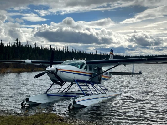An RCMP float plane on the shore of a remote lake in the Skeena Region during hunting patrols near Dease Lake and Atlin