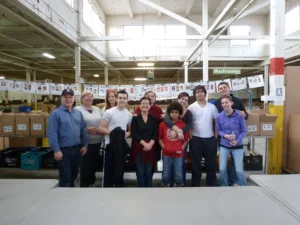 Volunteers inside a food bank warehouse in Toronto
