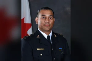 Chief Superintendent Mandeep Mooker in RCMP dress uniform, official portrait
