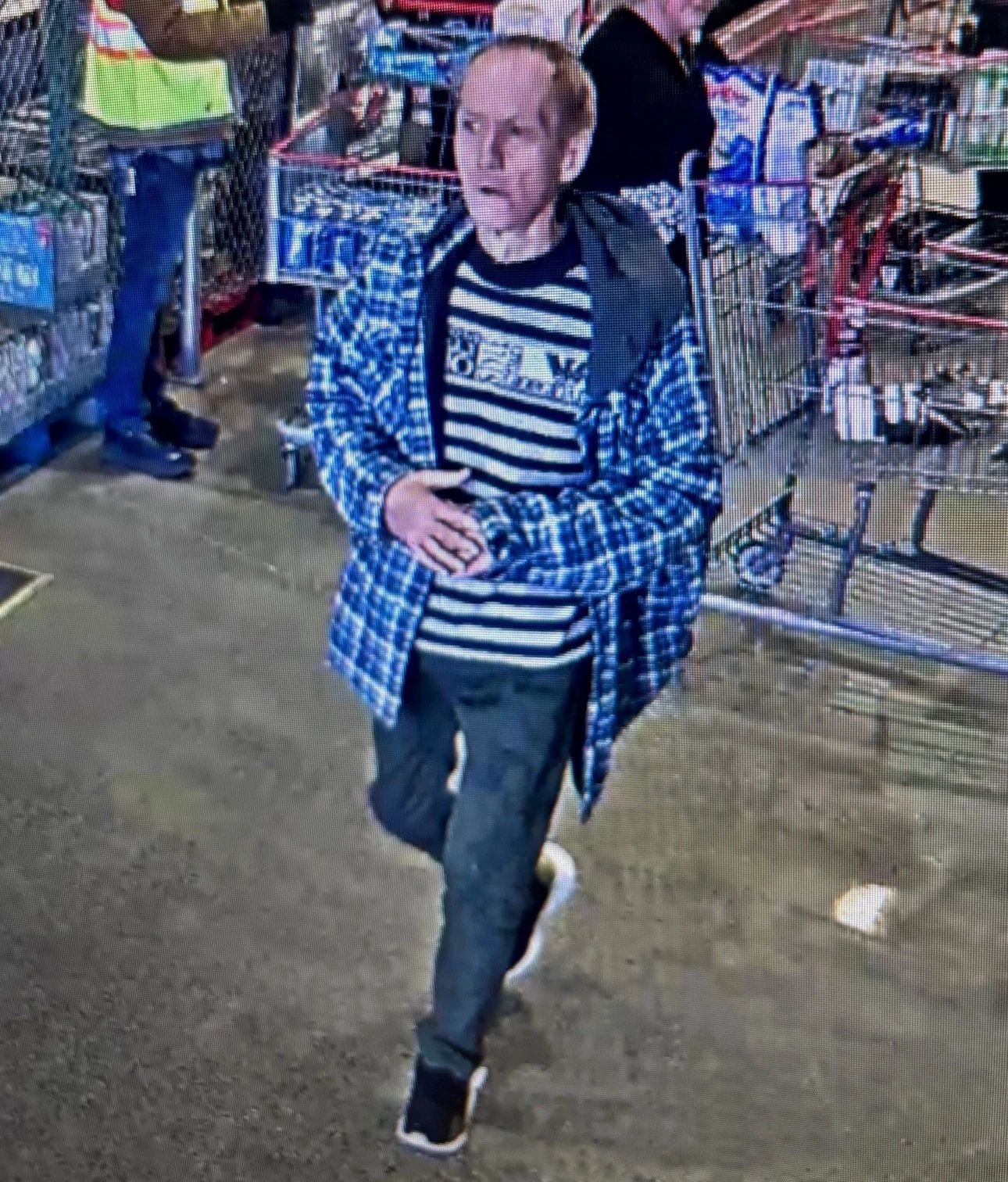 Full surveillance image of the man Nanaimo RCMP want to identify after an attempted jewelry theft at the north Nanaimo Costco on Oct. 23, 2026. Photo: Nanaimo RCMP