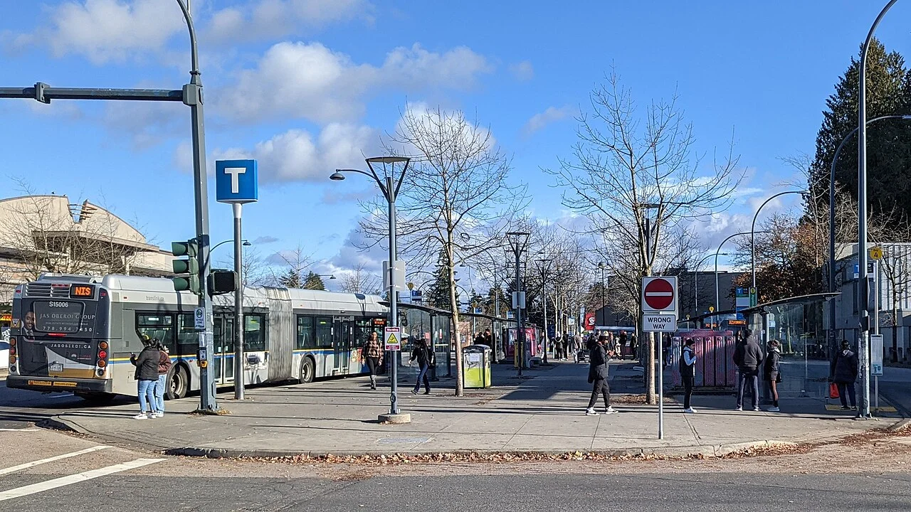Buses and riders at Newton Exchange in Surrey