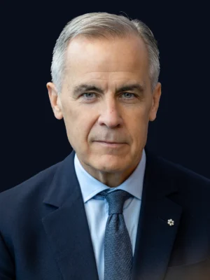 Portrait of Prime Minister Mark Carney against a blue background