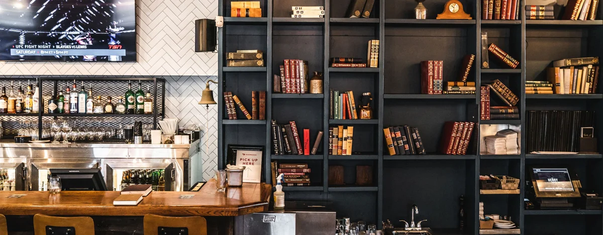 The Henry Public House bar and library shelves, Cloverdale, Surrey