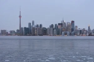 Toronto skyline at night with CN Tower, Cohere sovereign AI investment story