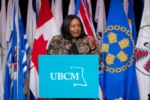 Trish Mandewo speaking at a UBCM podium