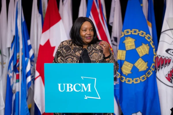 Trish Mandewo speaking at a UBCM podium